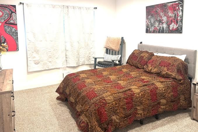 Cozy Lake House second bedroom with queen bed