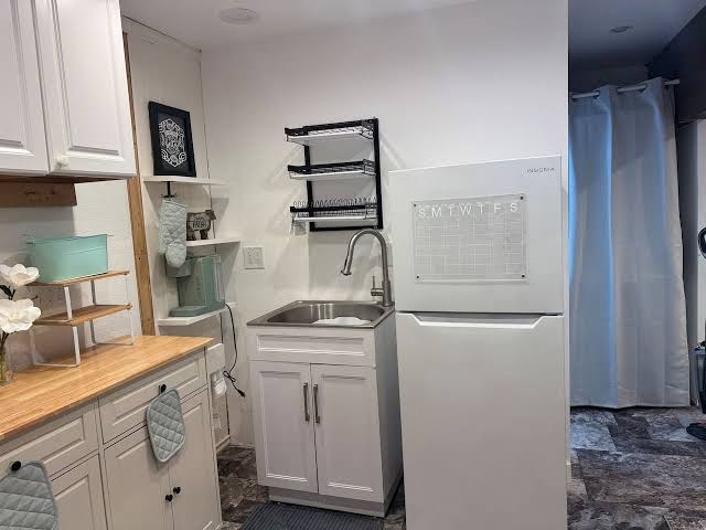 Cozy Lake House kitchen sink and prep area