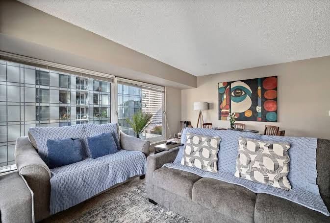 Pike Place Condo sitting area with two sofas and downtown views